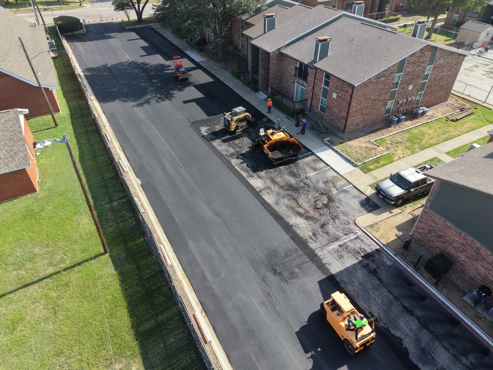 Commercial asphalt paving operation viewed from above