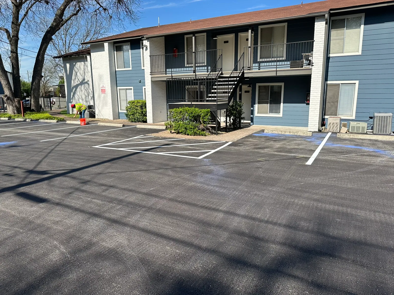 Fresh parking stall striping at a multifamily property